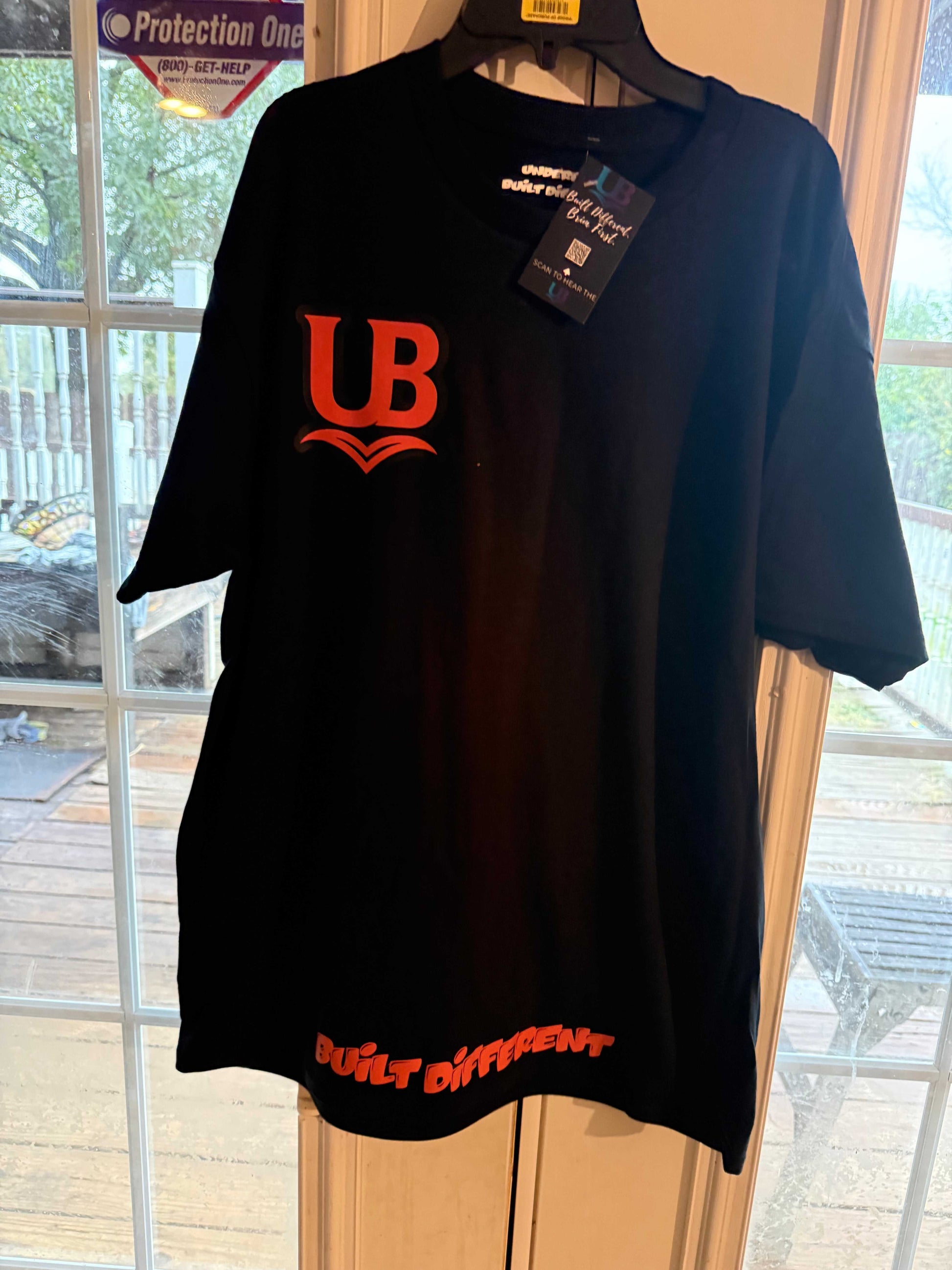 underbrim t shirt front view with orange logo 