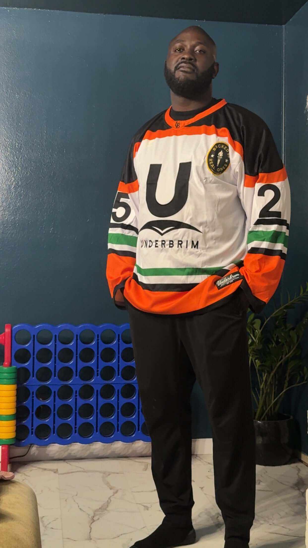 Limited edition streetwear jersey featuring Underbrim embroidery and player number 25, designed for bold streetwear style.