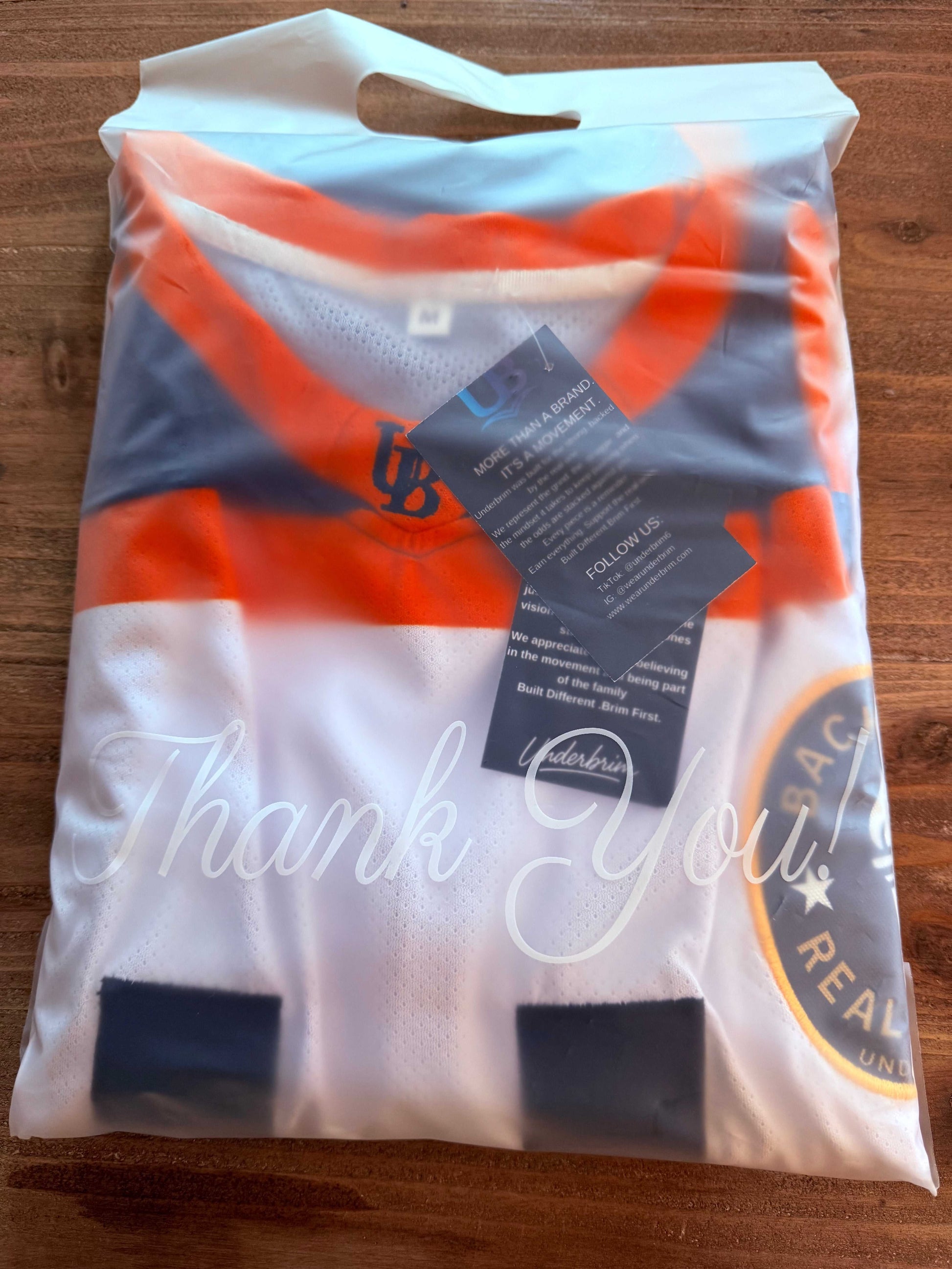 underbrim embroidered jersey  package in frosted thank you bag with brand tag and thank you card 